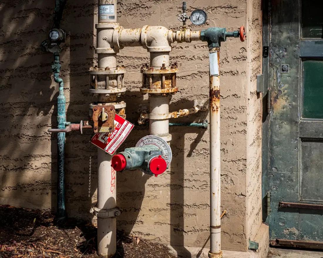 Outdoor pipes with shut off valves and a gauge